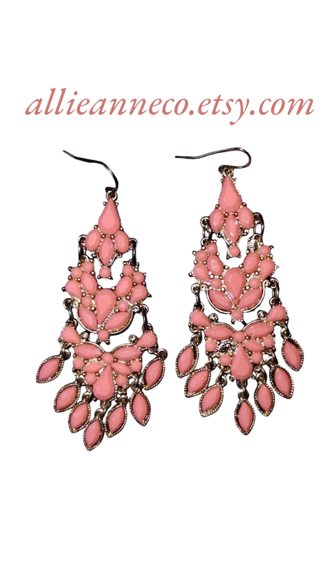 Bohemian Chandelier Earrings in a pretty peachy pink color that are 3 inches long..