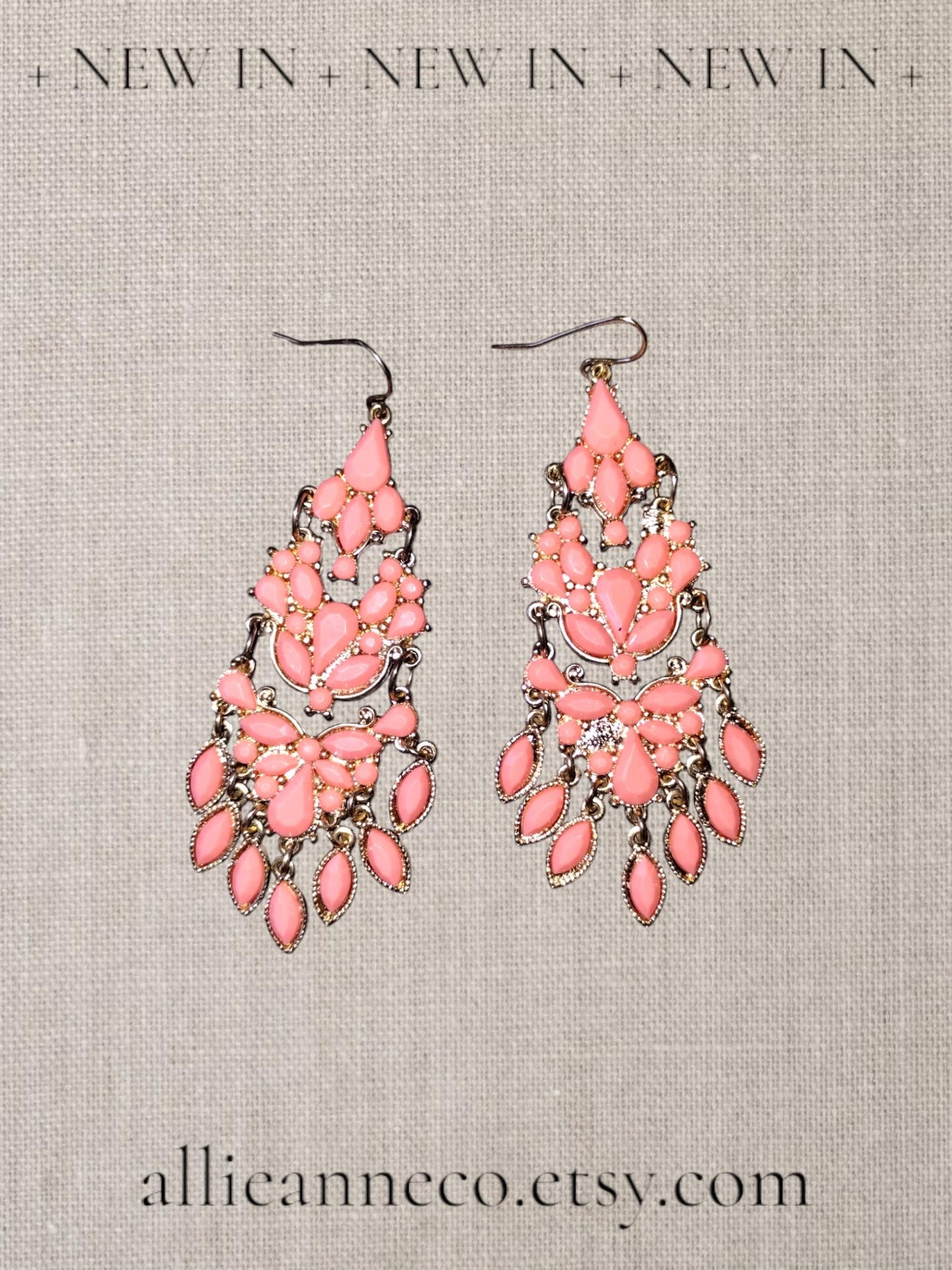 Bohemian Chandelier Earrings in a pretty peachy pink color that are 3 inches long..